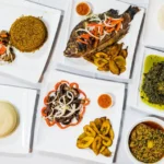 African restaurant interior with traditional dishes served on table